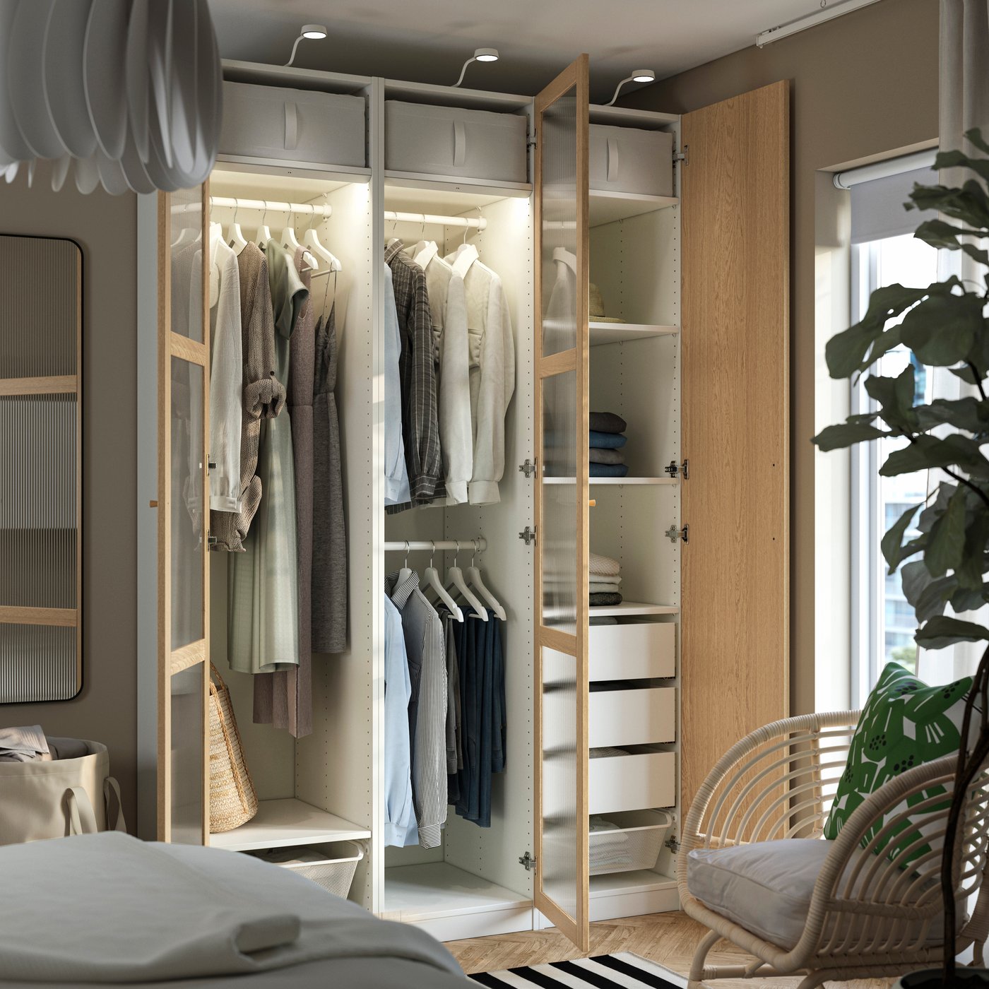 A white/oak veneer glass PAX wardrobe combination