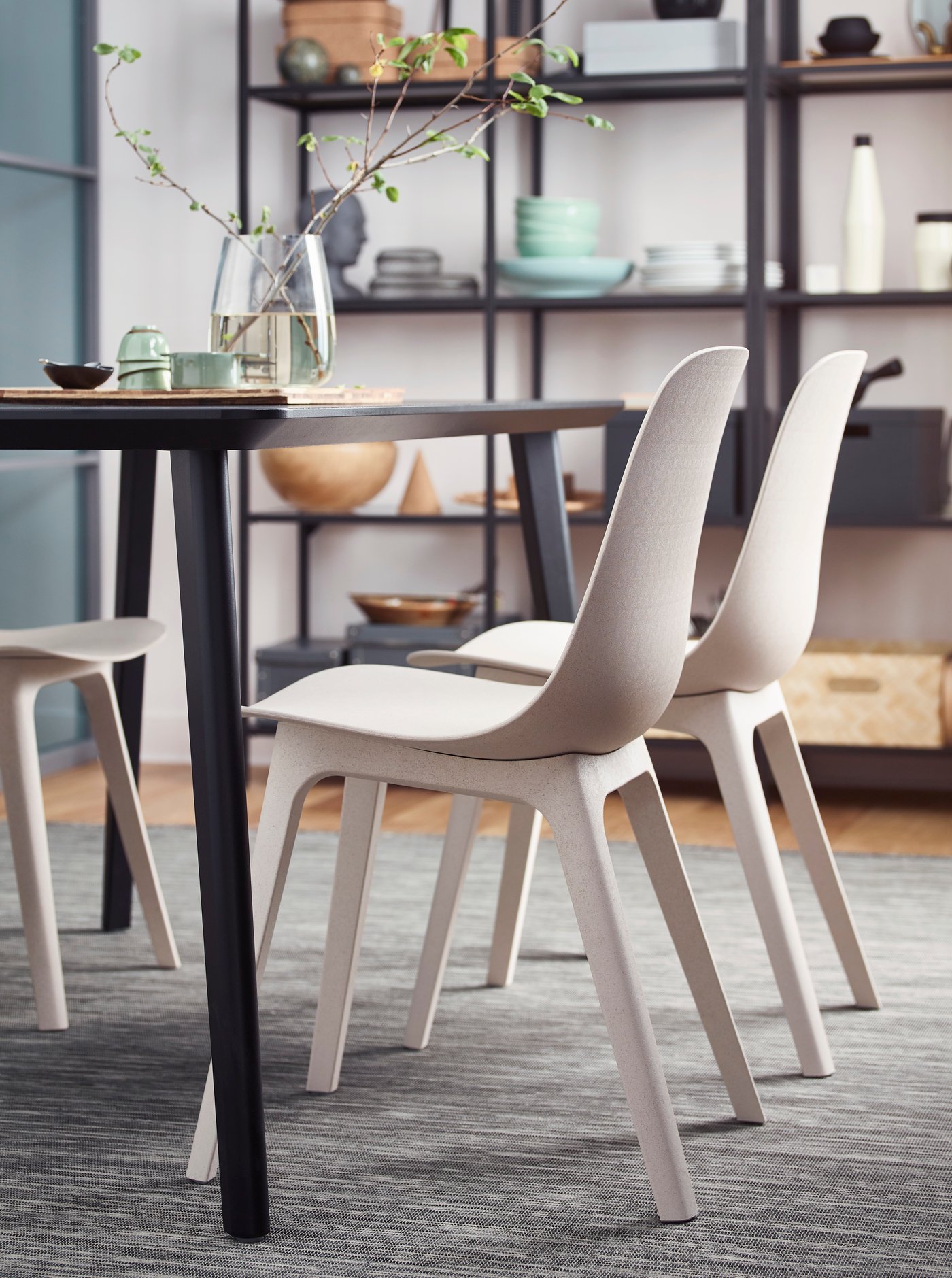 Beige dining chairs at the dining table in the dining room.