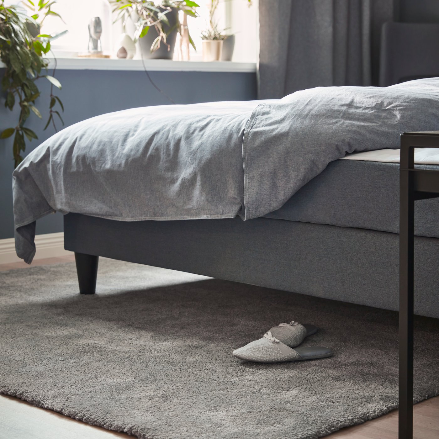 A medium grey STOENSE rug, low pile