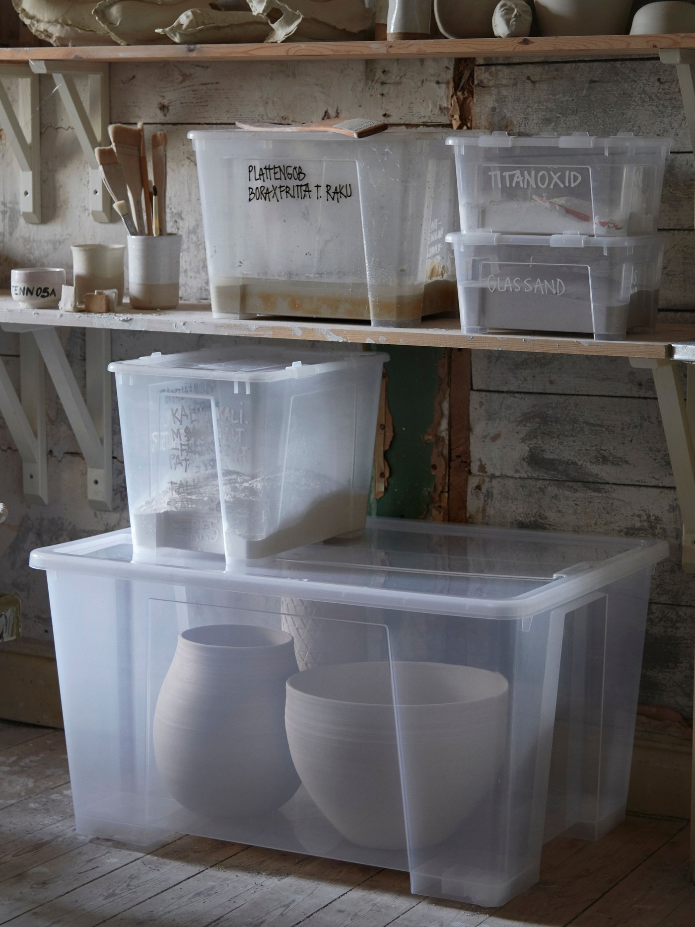 IKEA SAMLA transparent storage boxes in different sized containing different tools and material.
