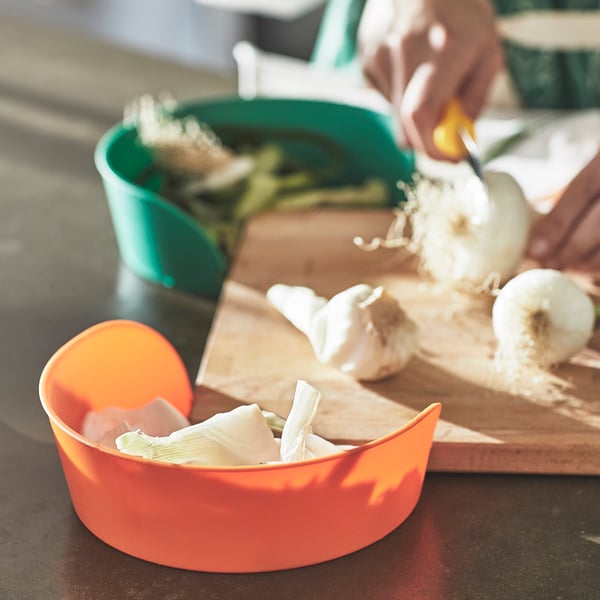 A mixed colours UPPFYLLD preparation bowl
