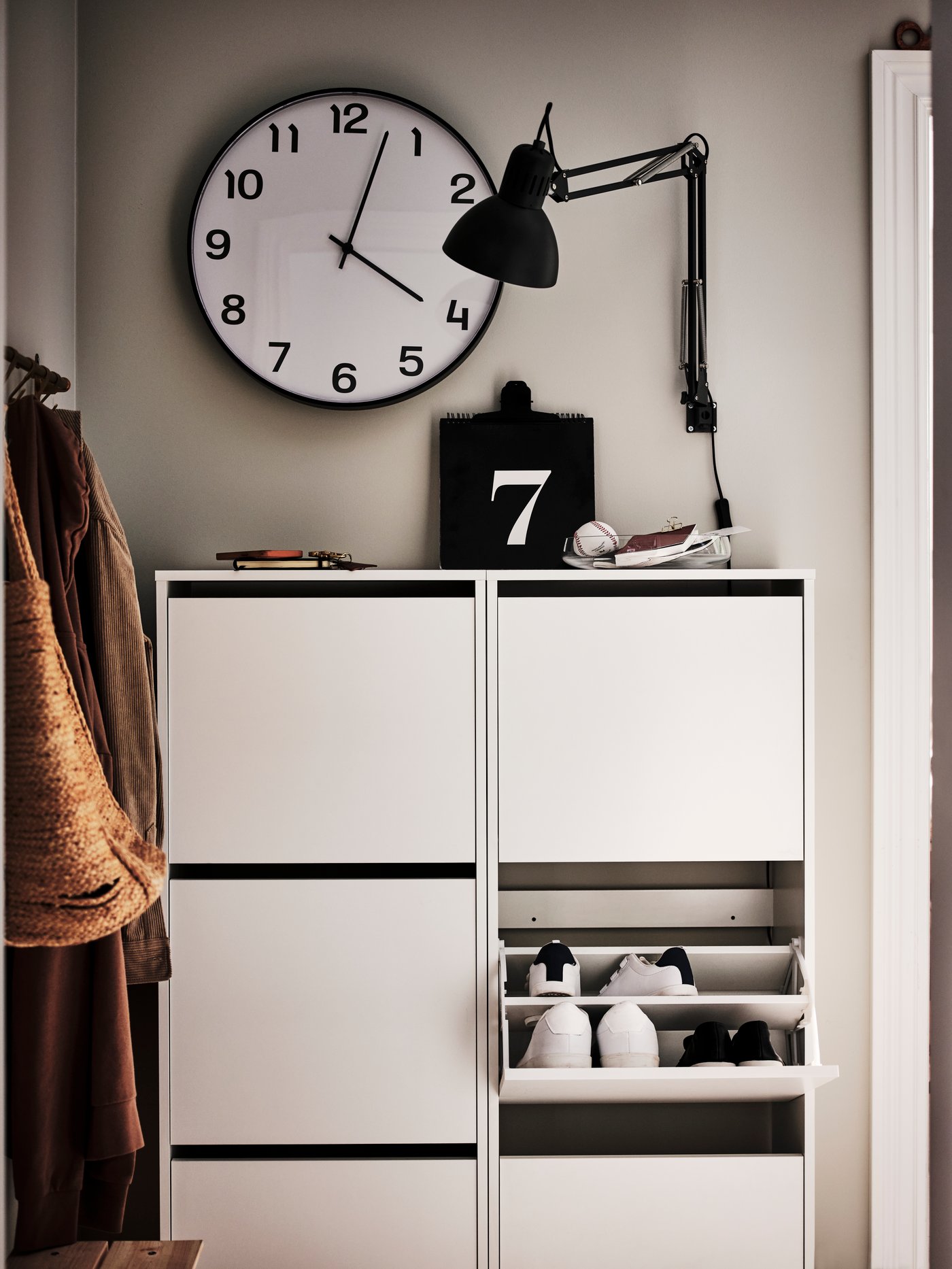 A white BISSA shoe cabinet with 3 compartments