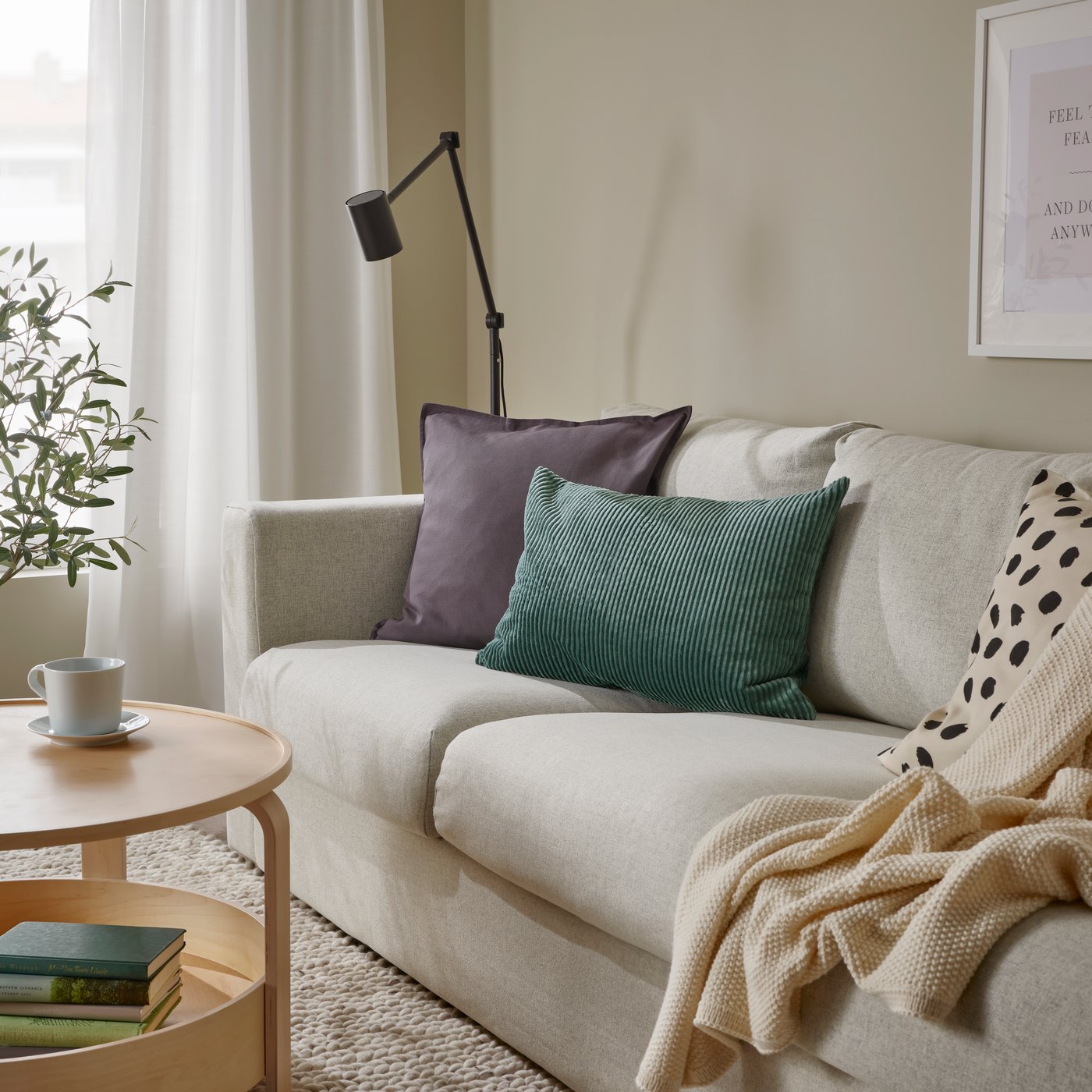 A dark grey-turquoise ÅSVEIG cushion cover