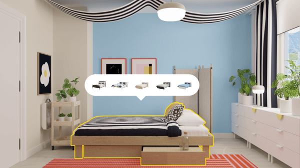 GLAMBERGET bed being placed into an open, airy bedroom space in the IKEA Kreativ app.