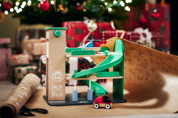 A multicolour LILLABO garage with car and helicopter in the living room