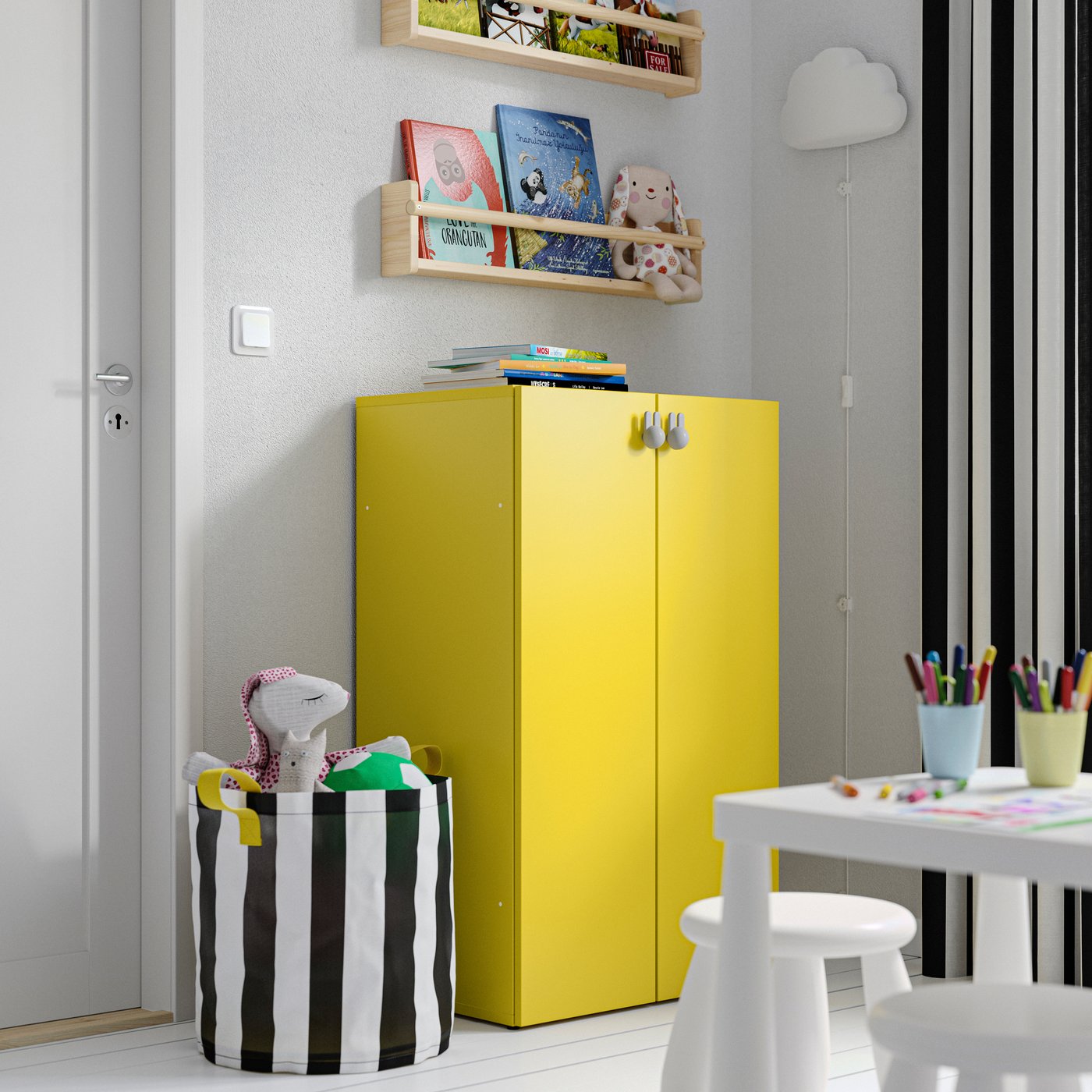 Yellow LASTARE cabinet in a kid's room.