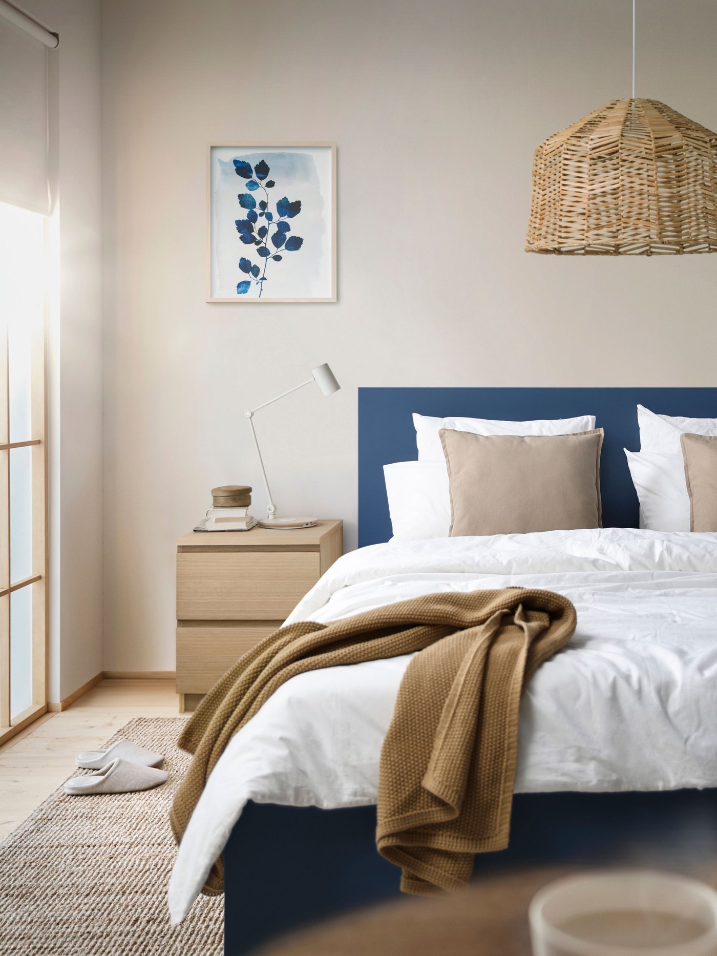 A blue MALM bed frame, high, w 2 storage boxes