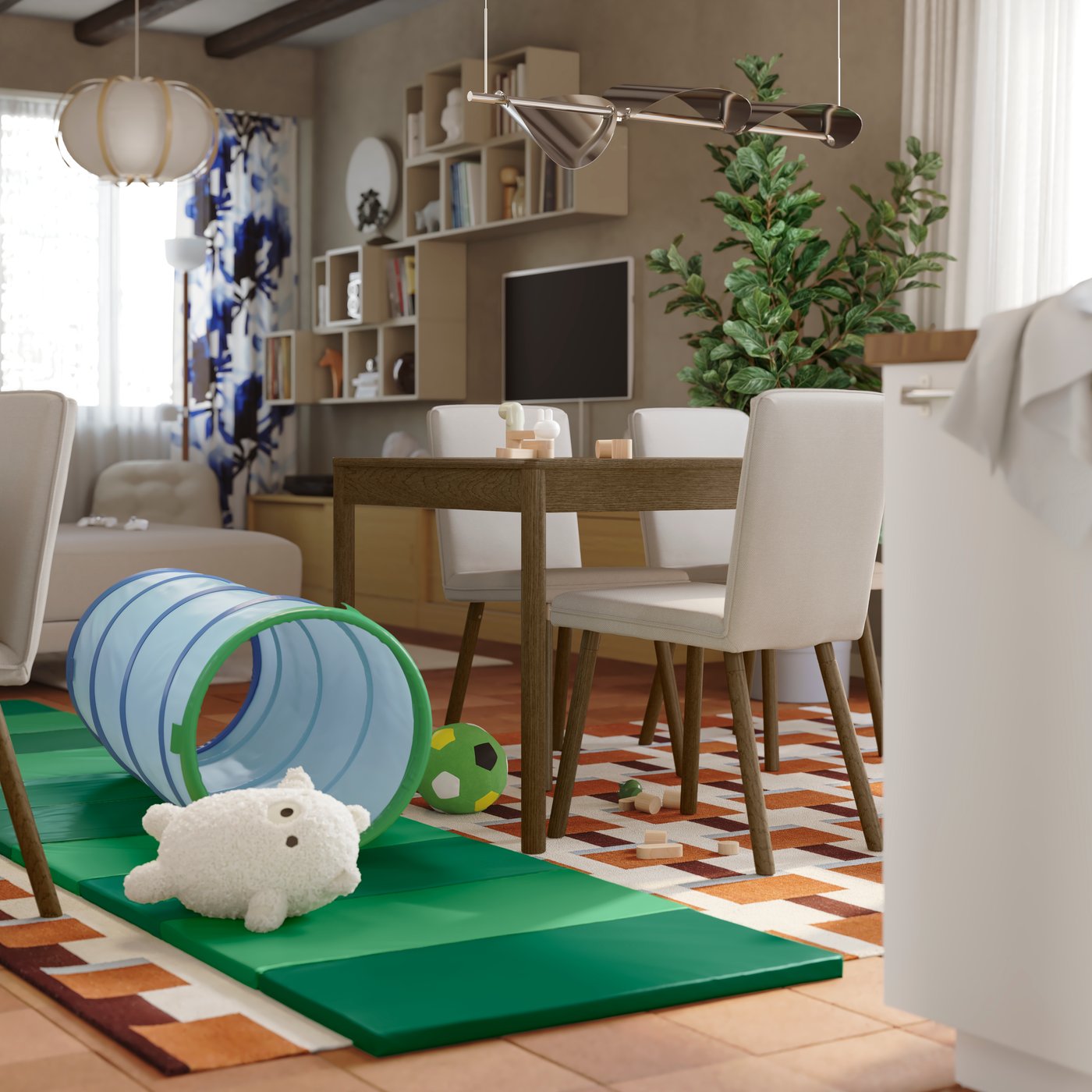 Children’s toys are lying on the floor in the middle of a home with an extendable dining table and chairs in the background.