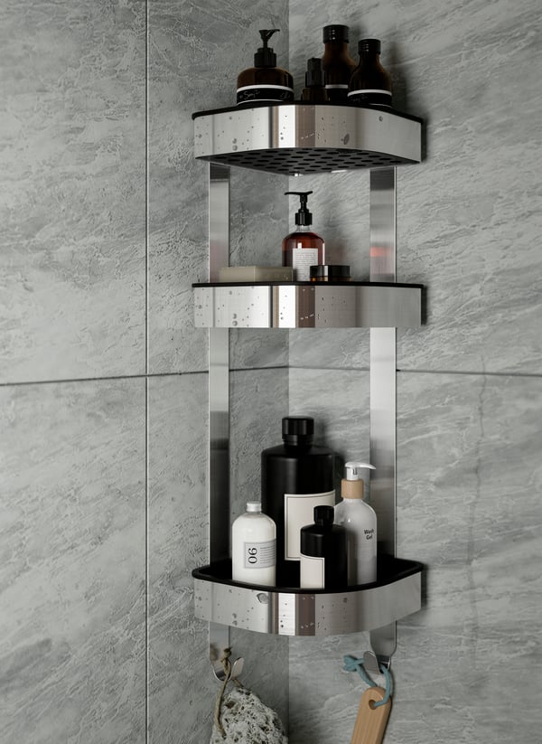 A stainless steel BROGRUND corner wall shelf unit in the bathroom