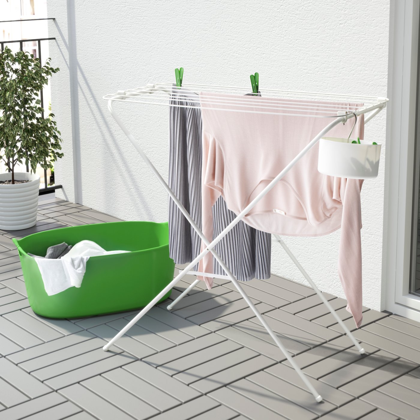A blue TORKIS flexi laundry basket, in-/outdoor