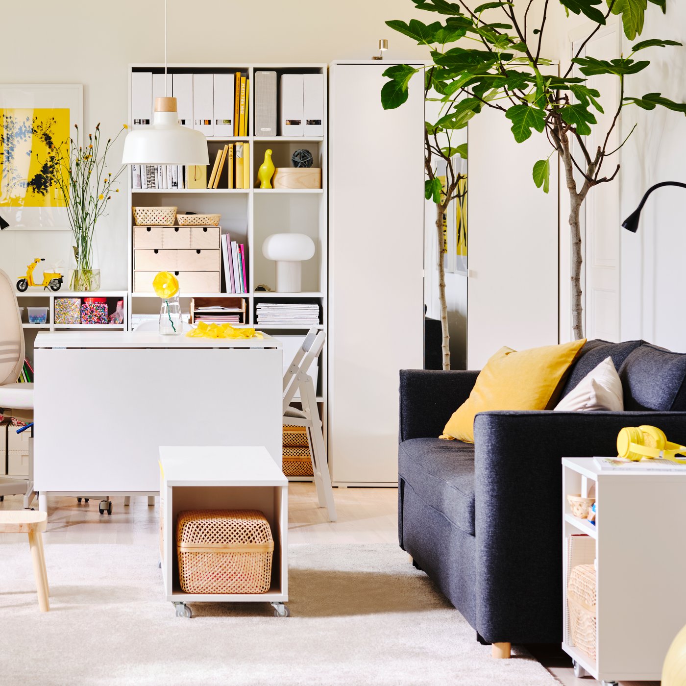 A white VIHALS sideboard in the living room