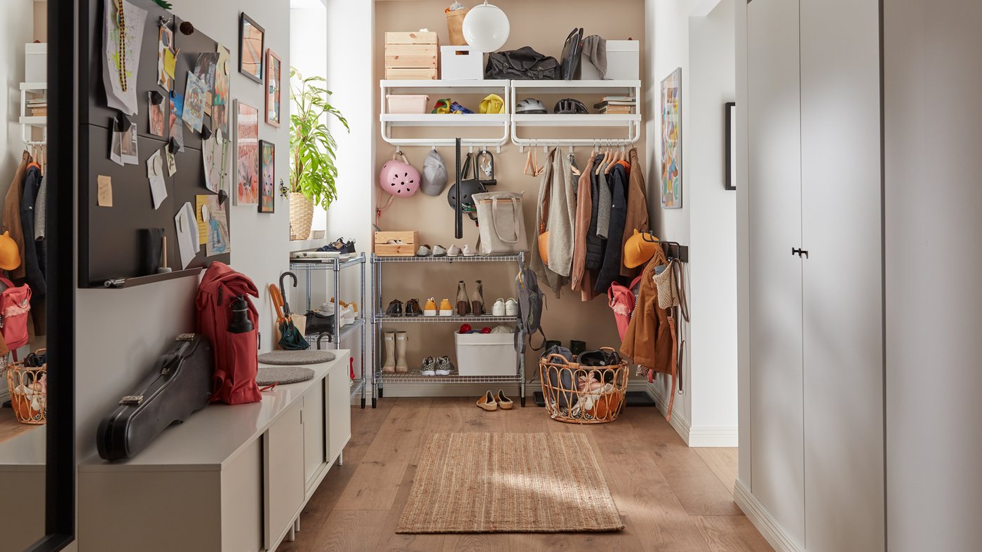 hallway with a closet and shoes