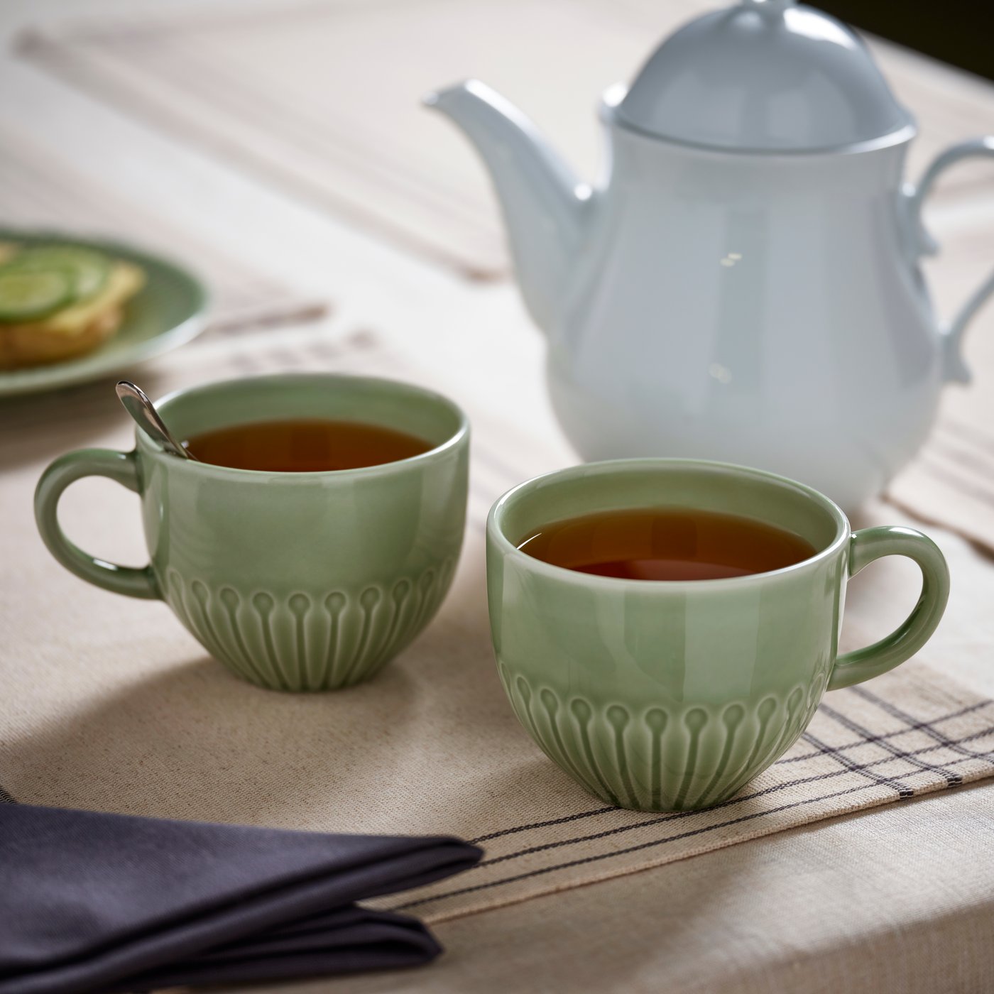 A stoneware pale grey-green STRIMMIG mug