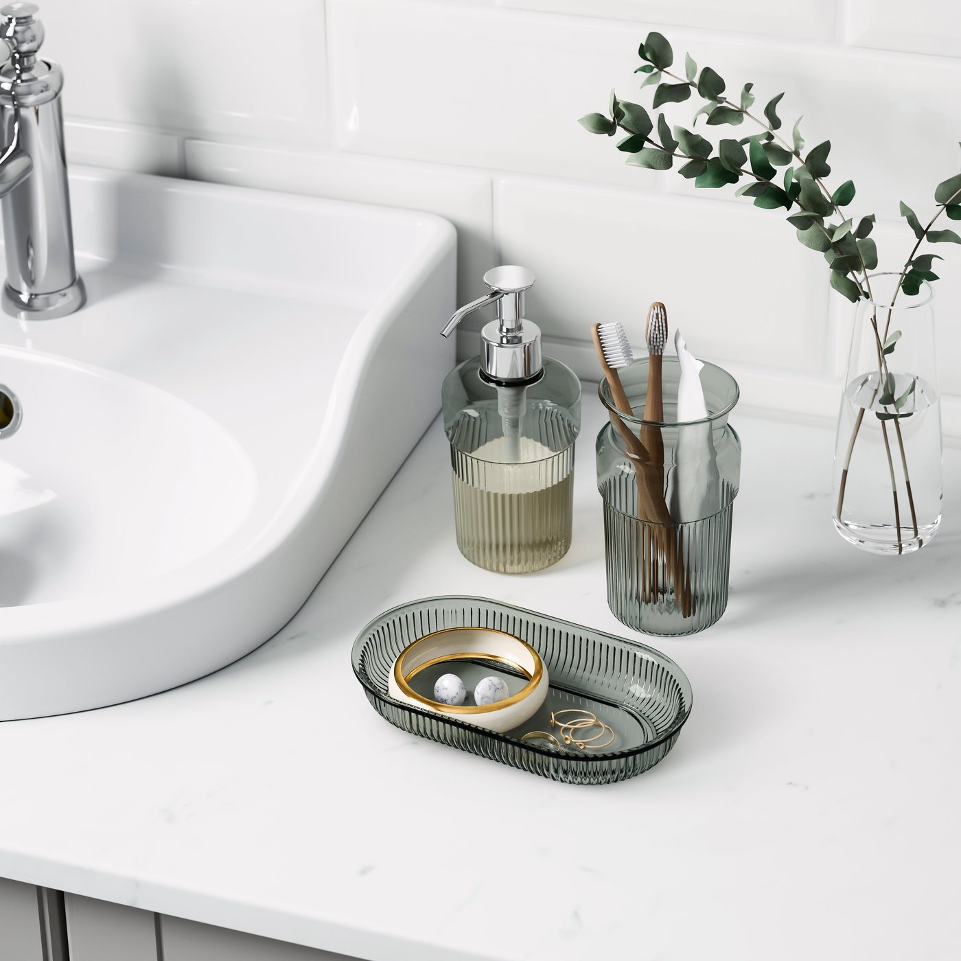 A grey BROFJÄRDEN 3-piece bathroom set in the bathroom