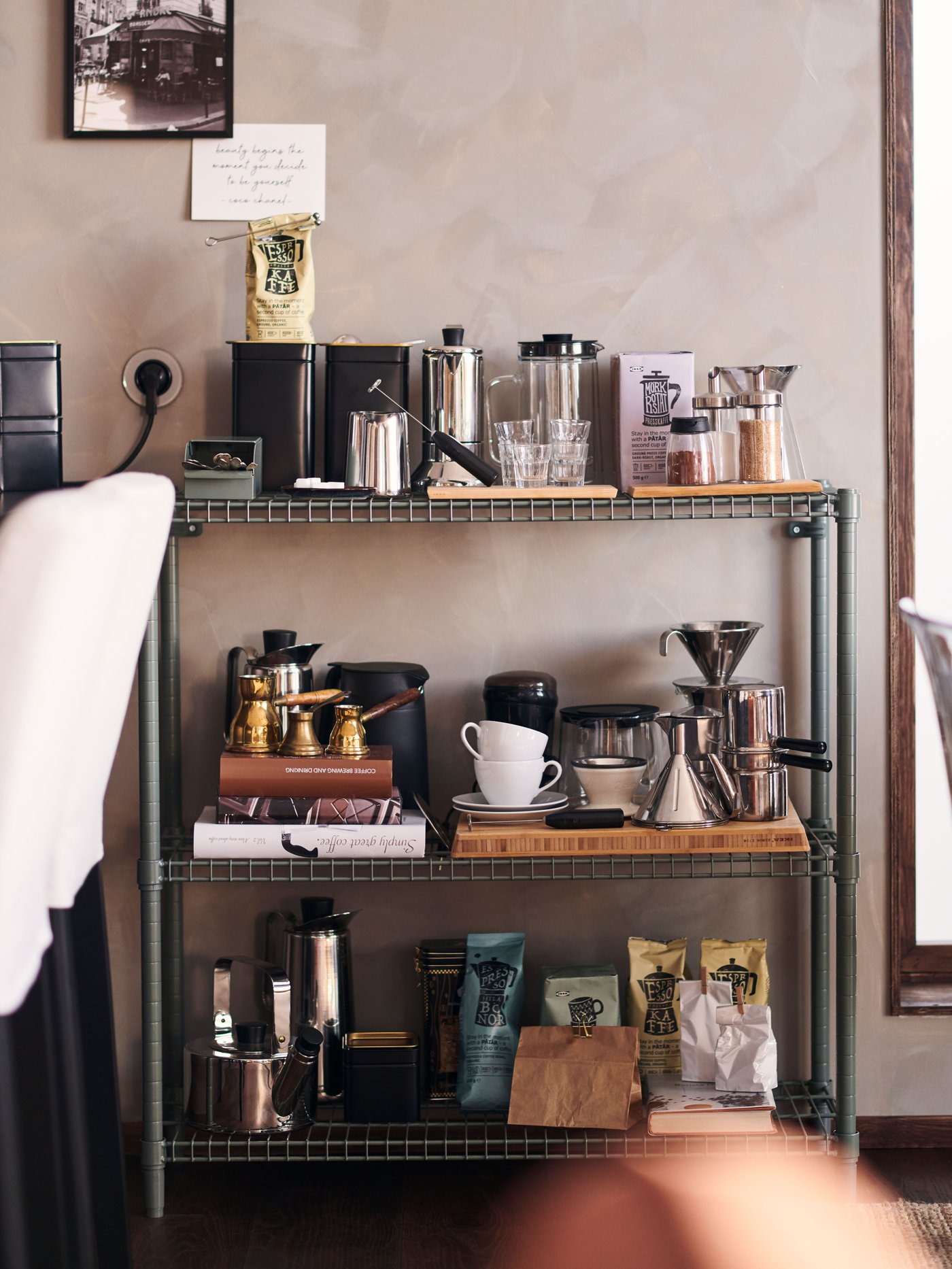 A white VÄRDERA coffee cup and saucer in the kitchen