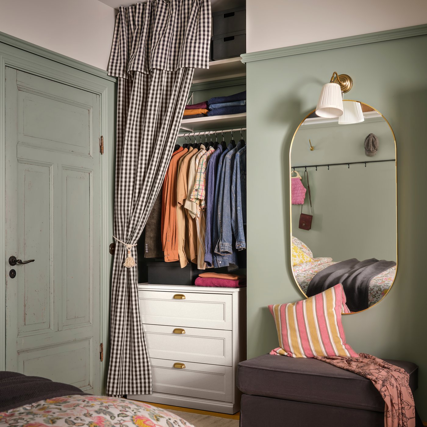A wardrobe area features an off-white FÅGELFJÄLLET chest of 3 drawers against a green wall with clothes hung above.