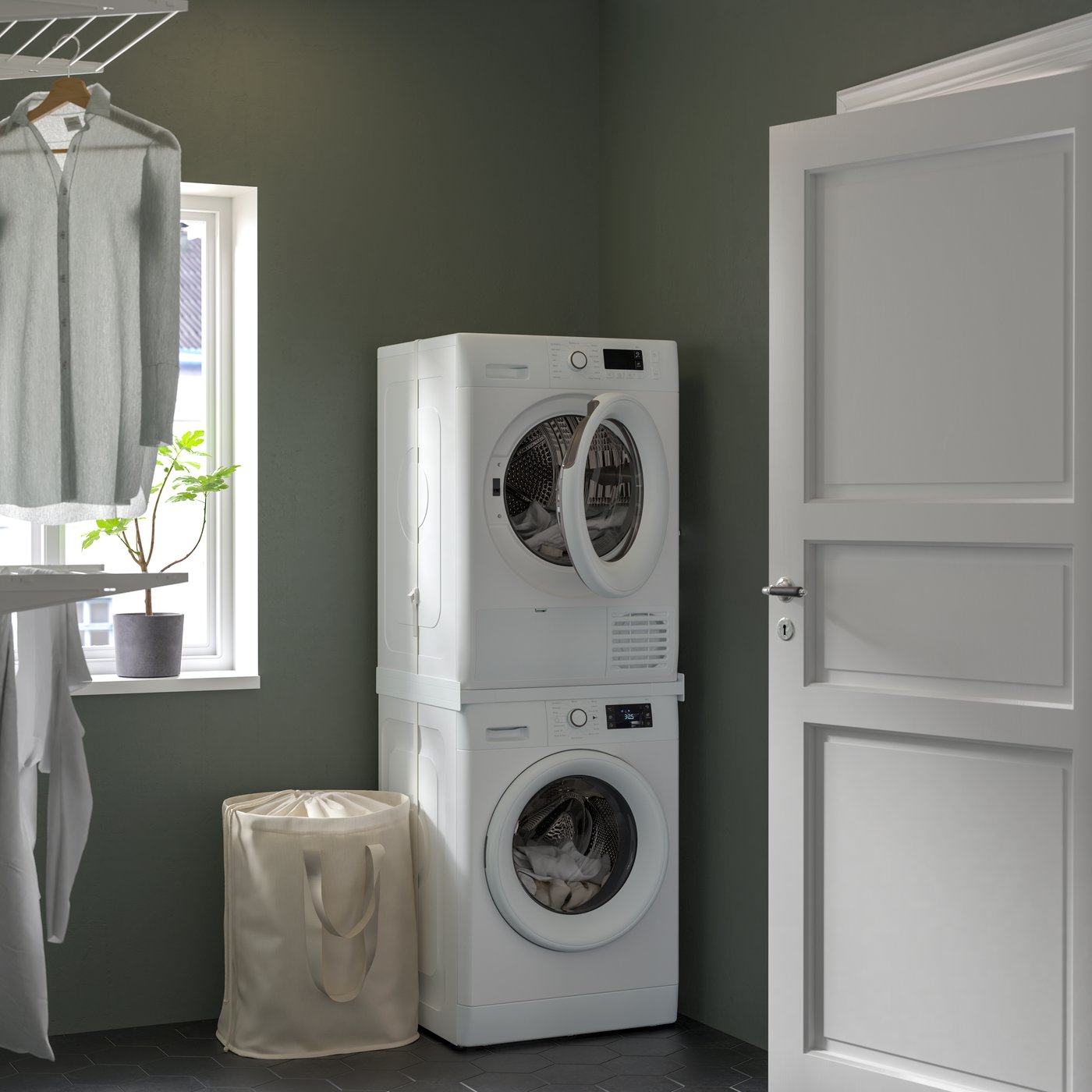 An IKEA 500 UDDARP washing machine in the laundry room