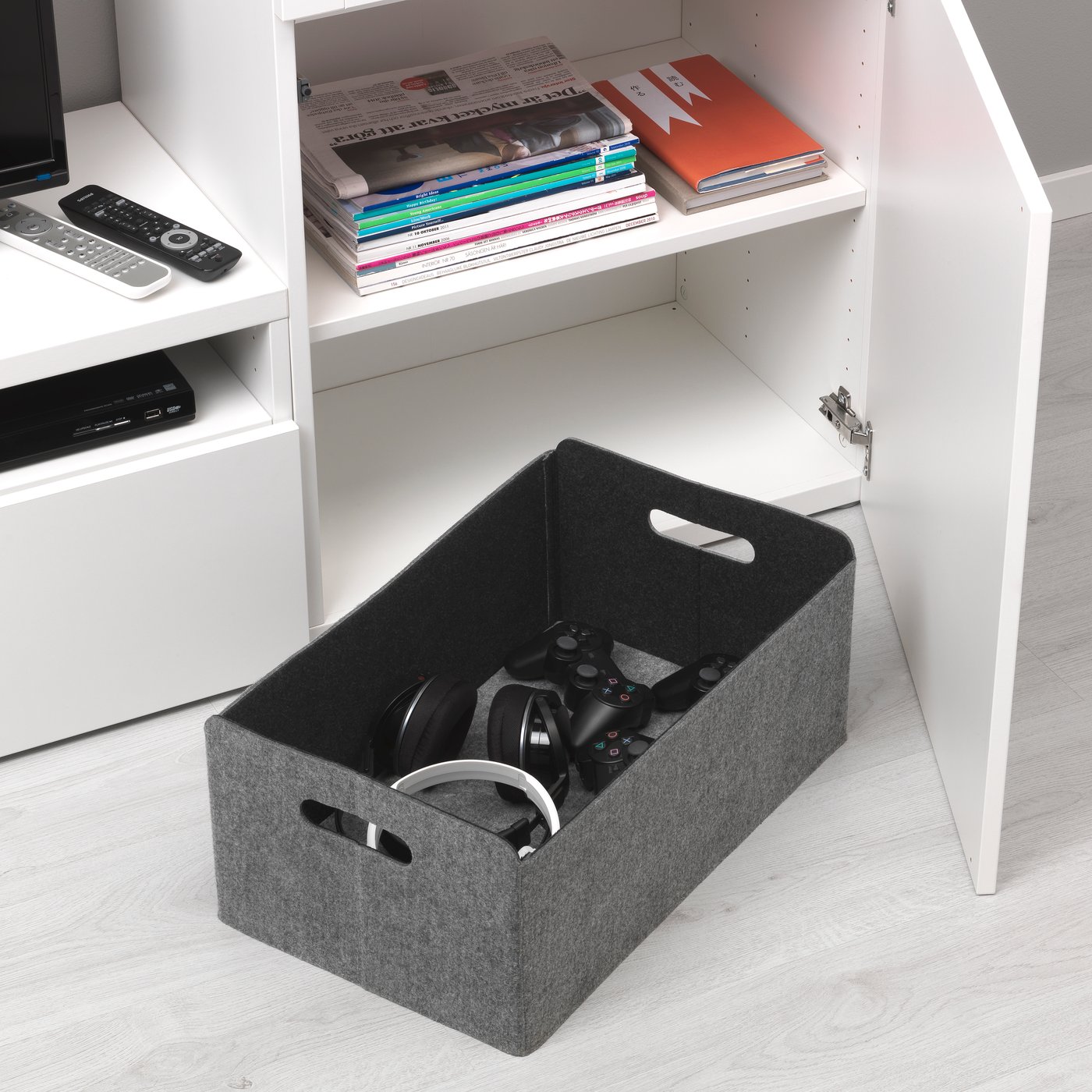 A grey BESTÅ box in the living room