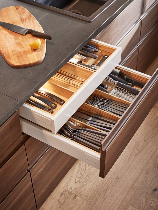 A bamboo VARIERA utensil tray in the kitchen