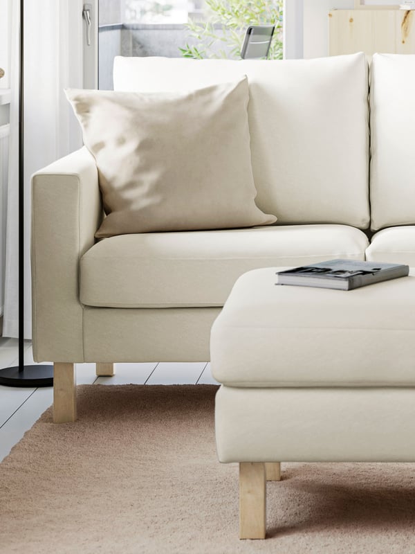 A Blekinge white SALTSJÖBADEN footstool in the living room