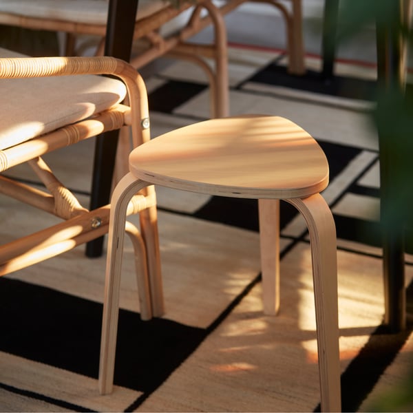A birch KYRRE stool in the dining room