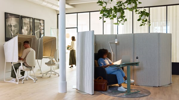 White NYMÅNE floor standing acoustic screen for office privacy and noise reduction