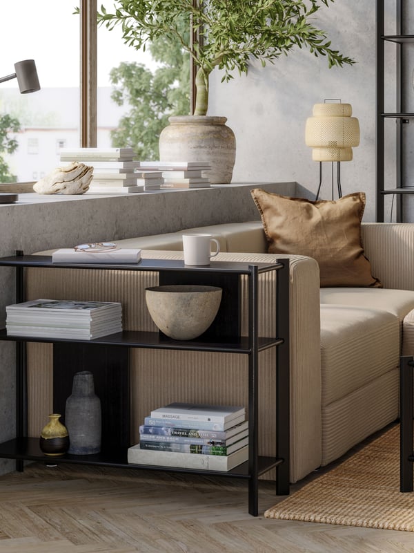 A black JÄTTESTA side table