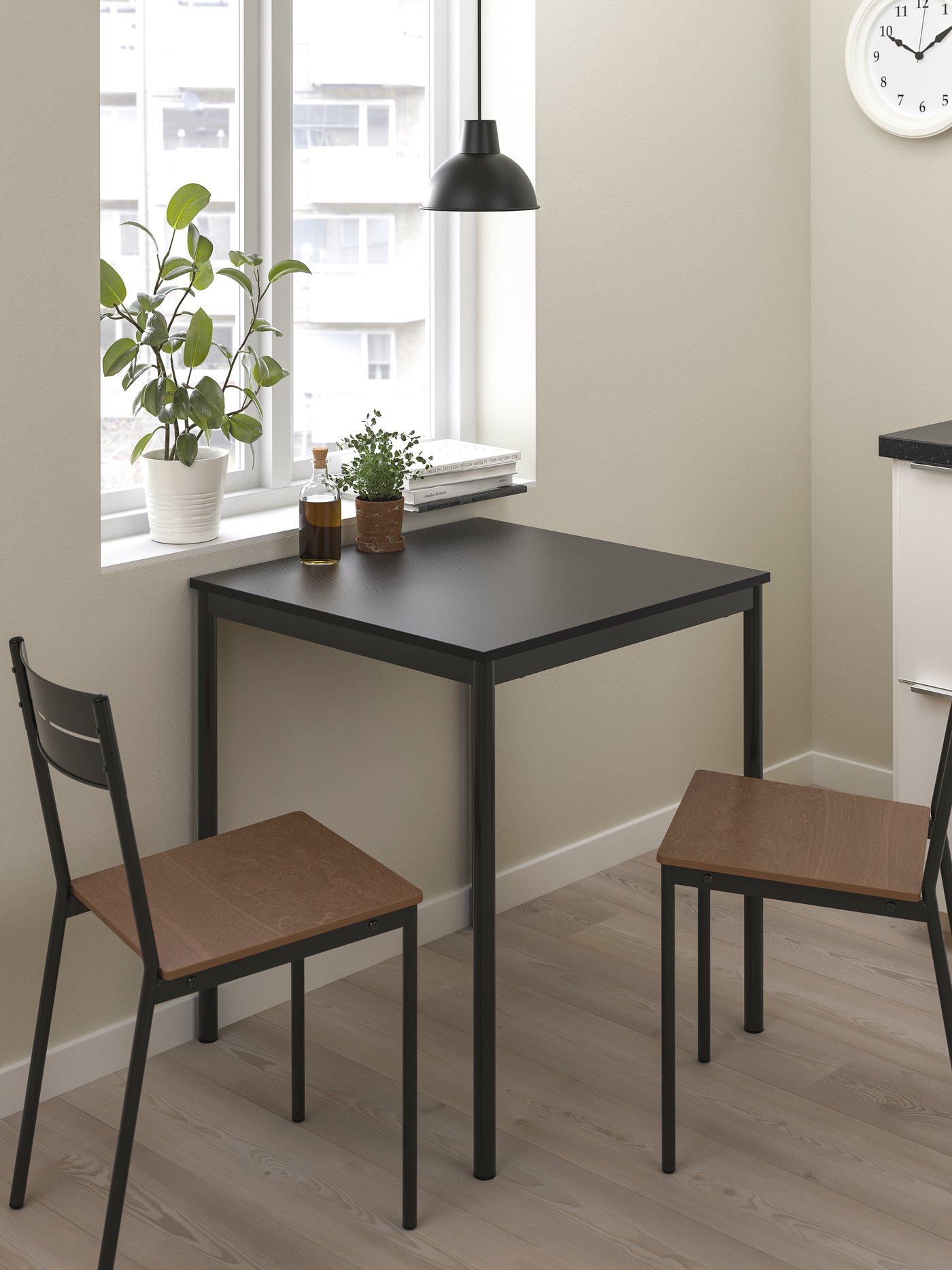 A black/black SANDSBERG table and 2 chairs