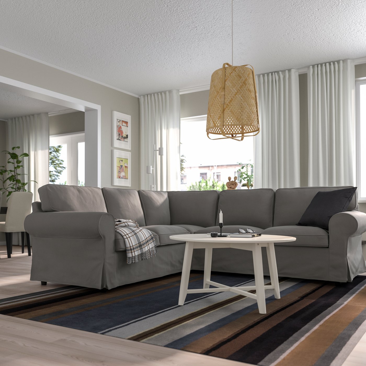 A Hakebo dark grey EKTORP corner sofa, 4-seat