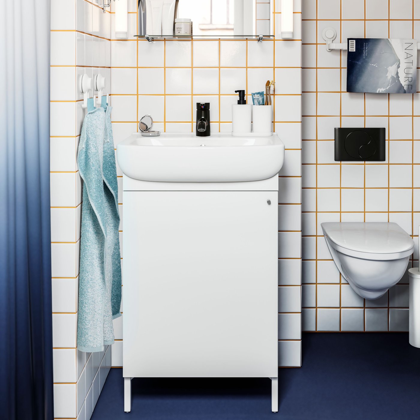A white NYSJÖN wash-basin cabinet in the bathroom