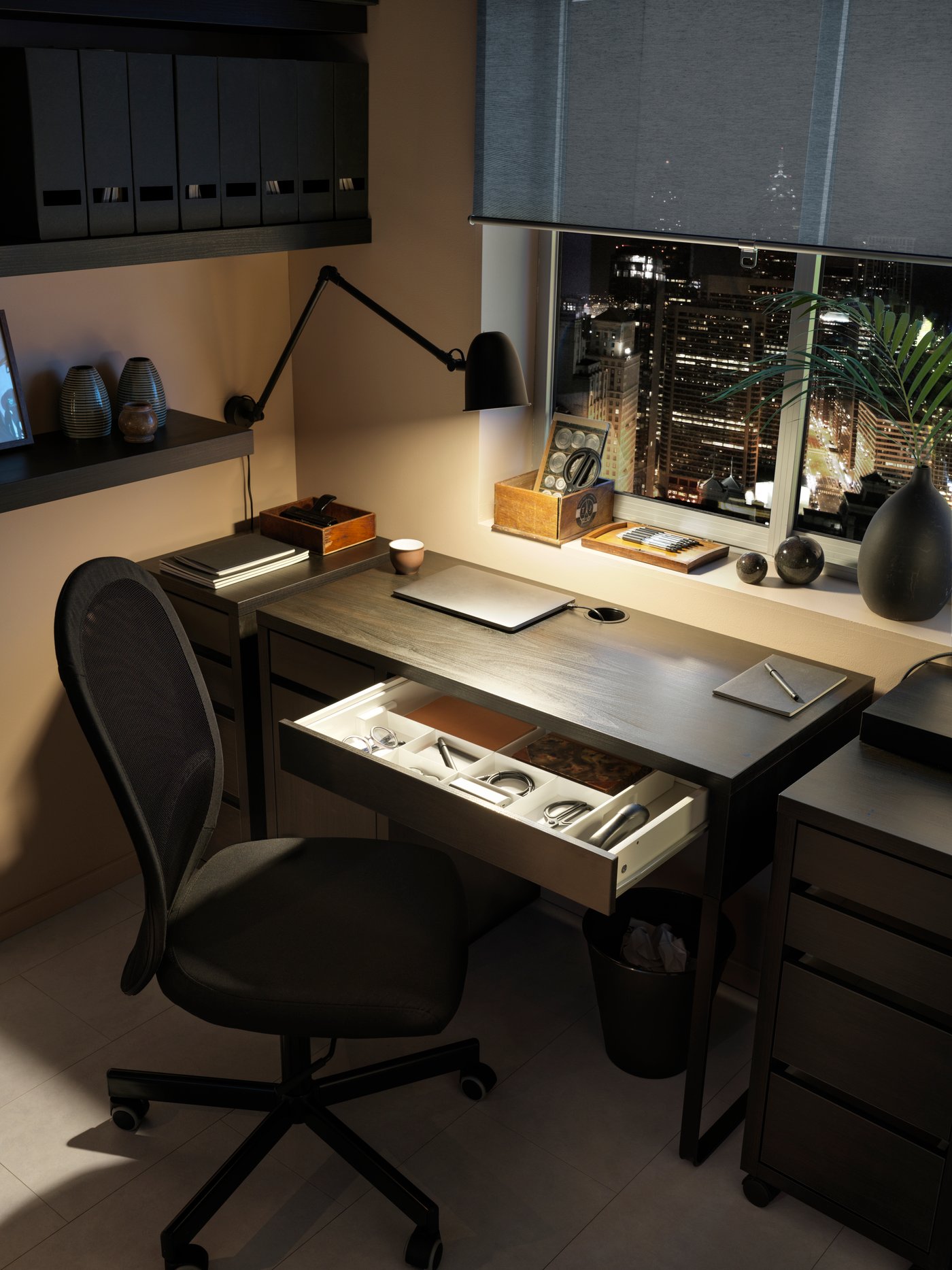 A black-brown MICKE desk in the home office