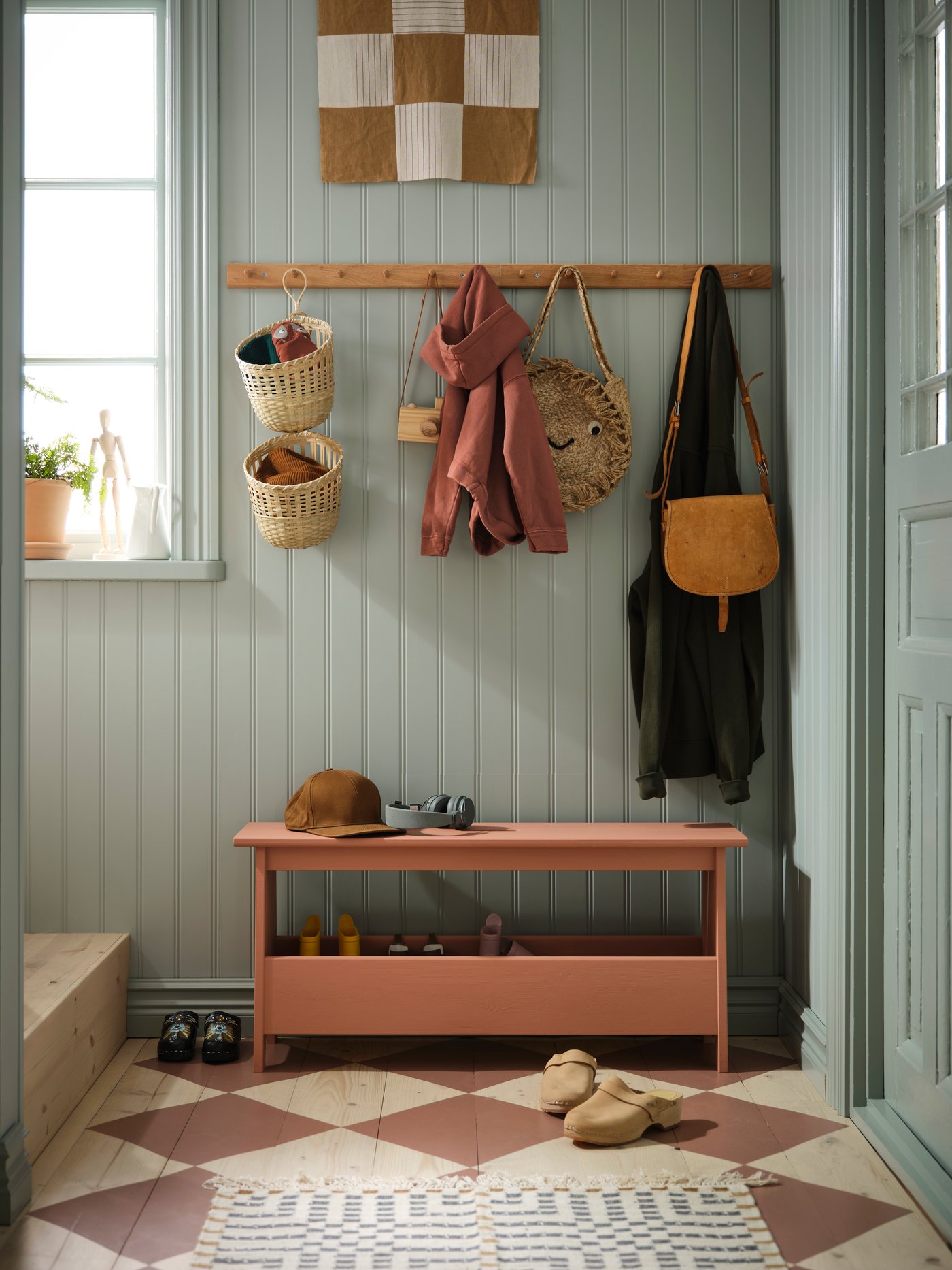 A handmade bamboo TOLKNING basket hanging