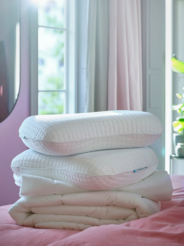 A light pink KALKFLY curtains, 1 pair in the bedroom