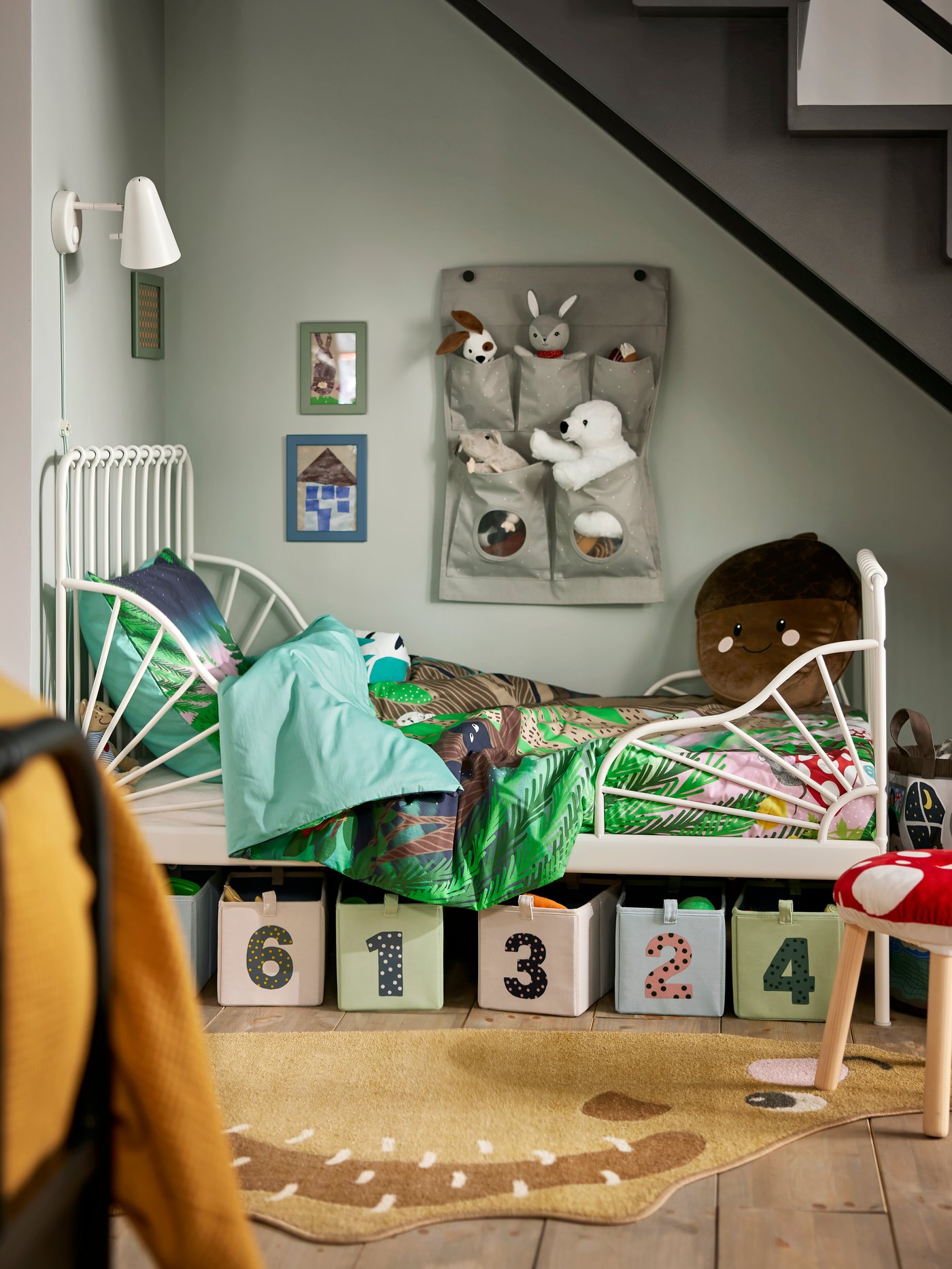 A dotted/light grey LEN hanging storage in the childrens room