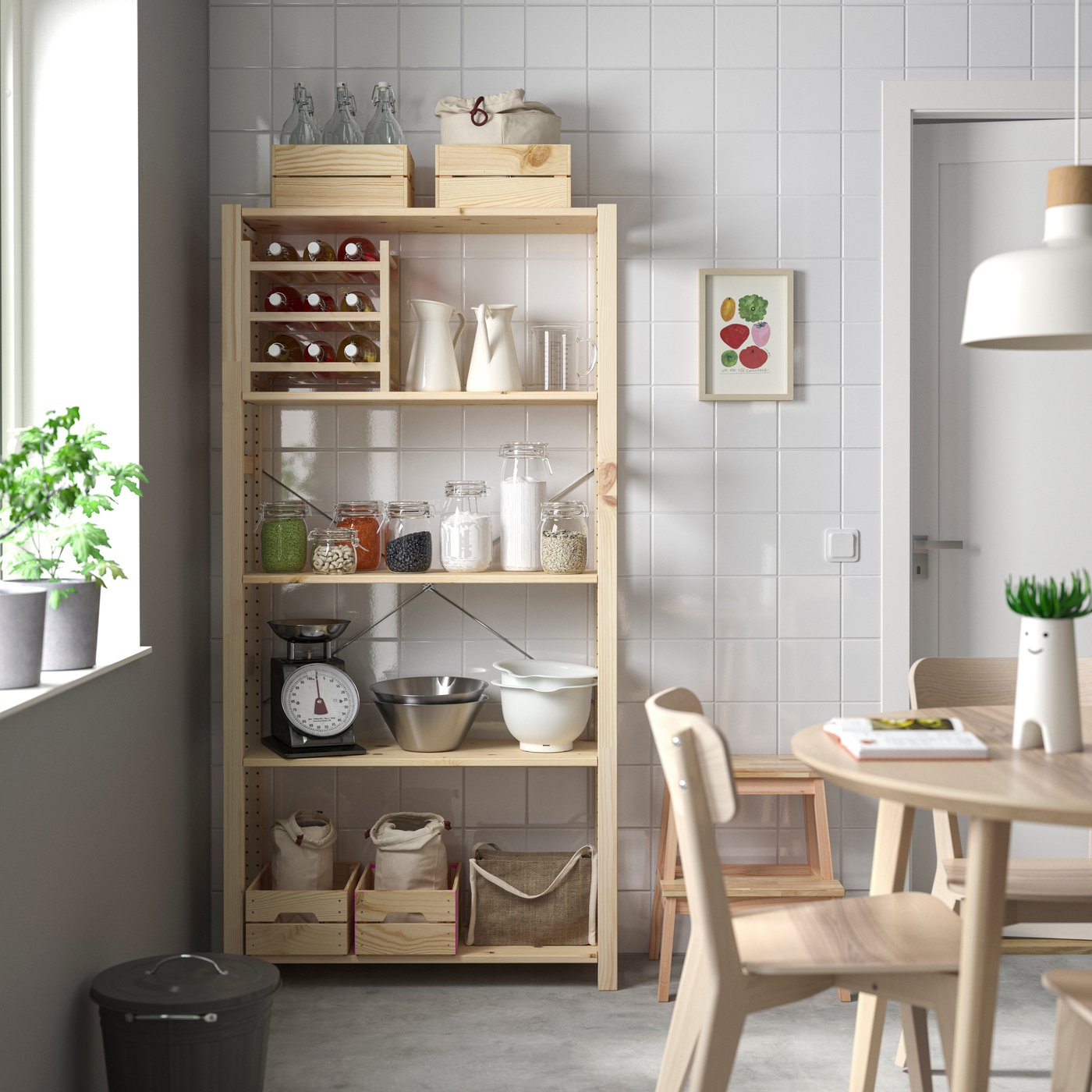 A pine IVAR shelving unit in the dining room