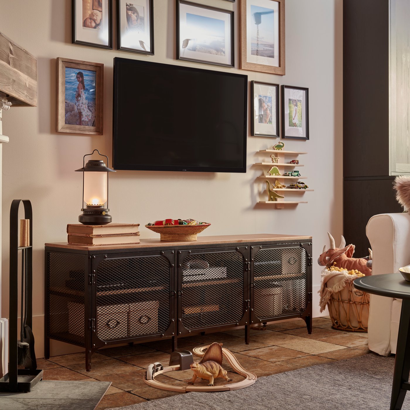 A black FJÄLLBO TV bench in the living room