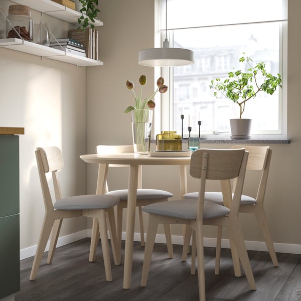 Ash LISABO dining table and chair beside a bright window.