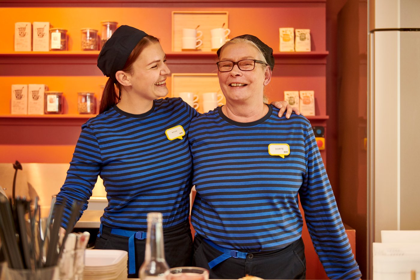 Food co-workers in Swedish food market