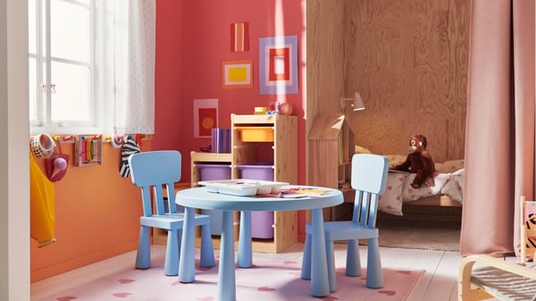 A light white stained pine TROFAST frame in the childrens room