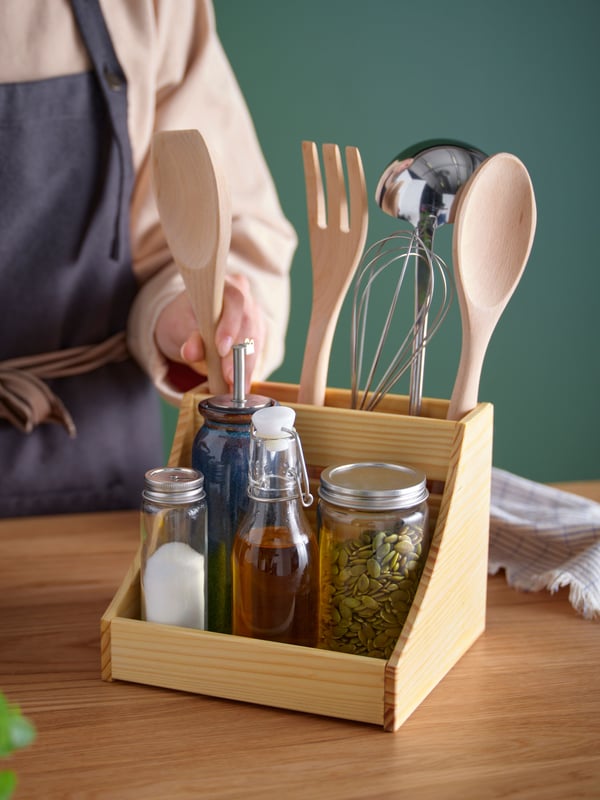 A clear glass KORKEN bottle with stopper