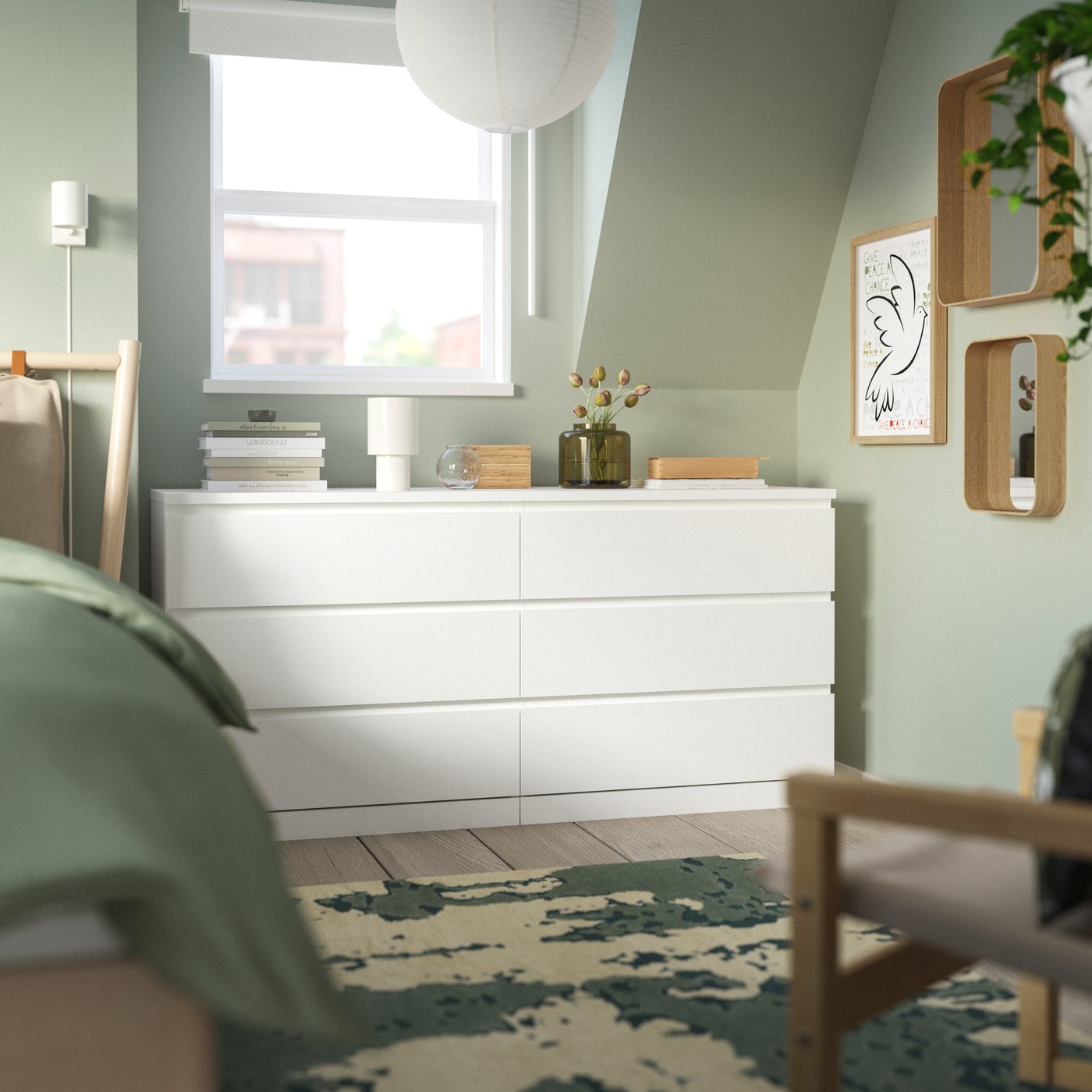 A white MALM chest of 6 drawers