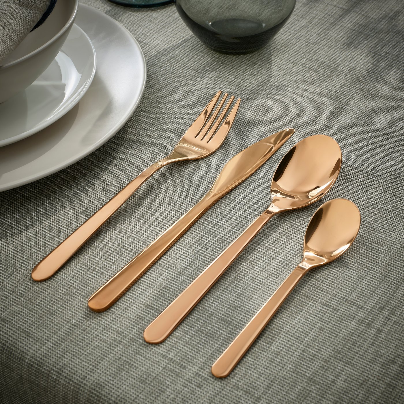 A rose-gold colour FÖRNUFT 24-piece cutlery set