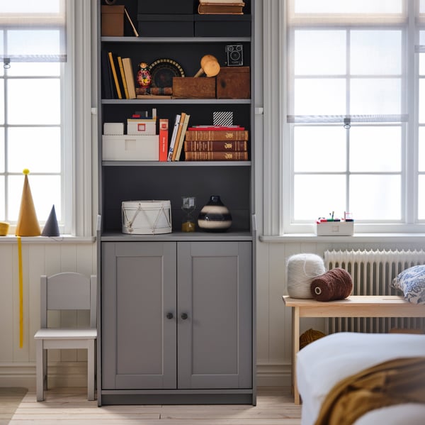 A pine PERJOHAN bench with storage
