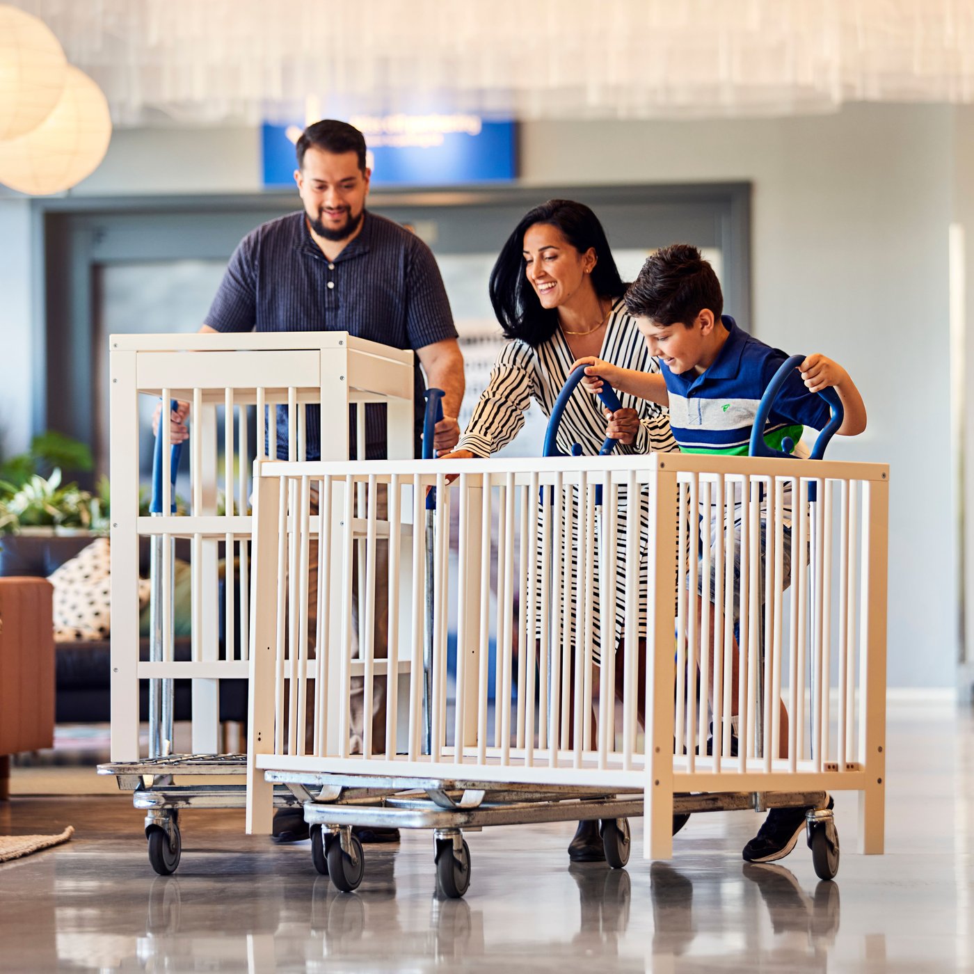 A family returns old IKEA furniture to IKEA through the Buy Back service.