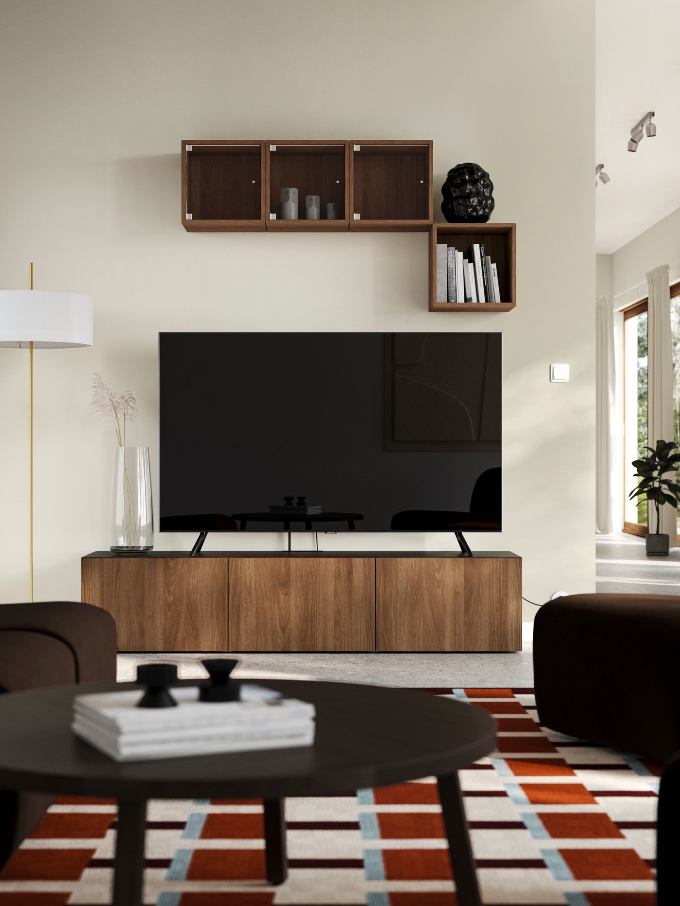 A white textile/brass-plated STOCKHOLM 2025 floor lamp in the living room