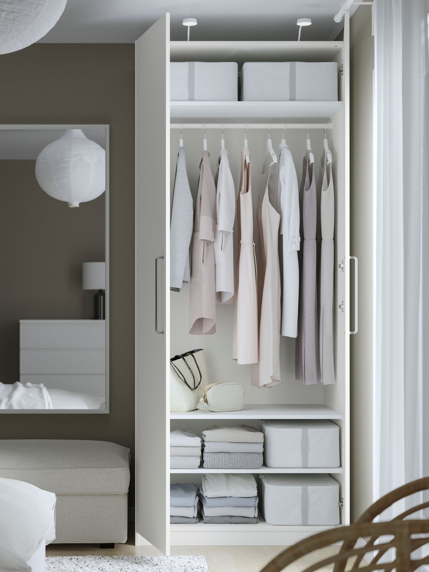 A white/white PAX wardrobe in the bedroom