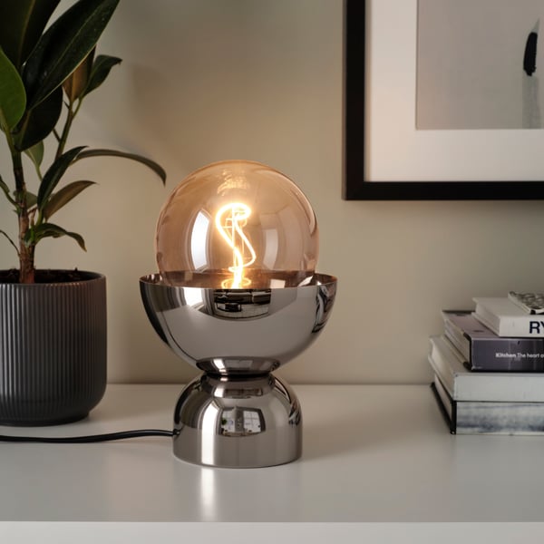 A nickel-plated ACKJA table lamp