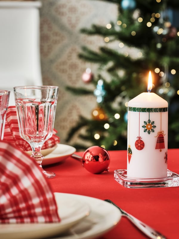 A christmas motifs white VINTERFINT unscented pillar candle