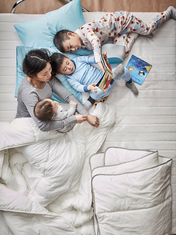 family on bed