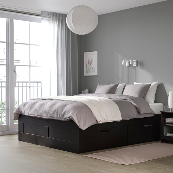 A black BRIMNES bed frame with storage